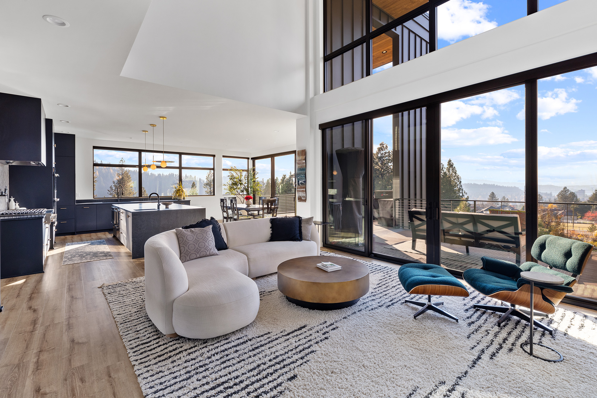 Interior detail of Fernan Hill Residence in Coeur d’Alene showing custom lighting fixtures, natural wood finishes, and modern craftsmanship